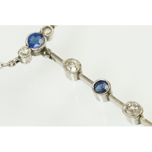 10 - Early 20th Century Edwardian sapphire and diamond pendant necklace. The necklace having a pendant dr... 