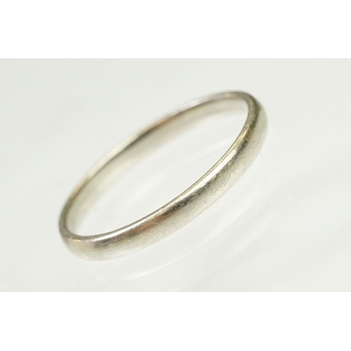 107 - Platinum wedding band ring of plain form. Marked platinum to inner shank. Size N.