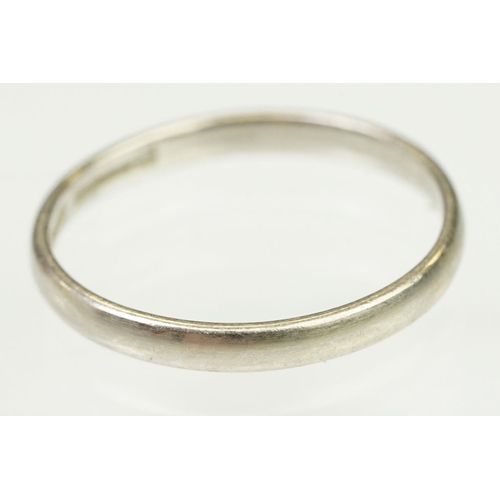 107 - Platinum wedding band ring of plain form. Marked platinum to inner shank. Size N.