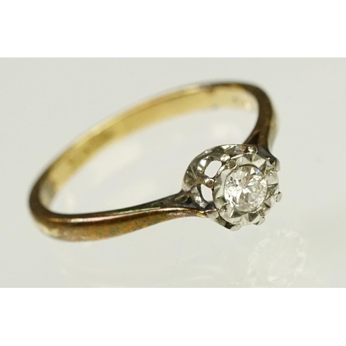 111 - Diamond solitaire ring being set with a round brilliant cut diamond in an illusion setting, mounted ... 