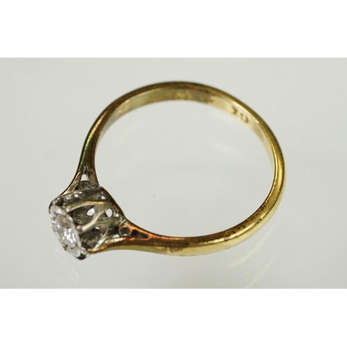 111 - Diamond solitaire ring being set with a round brilliant cut diamond in an illusion setting, mounted ... 