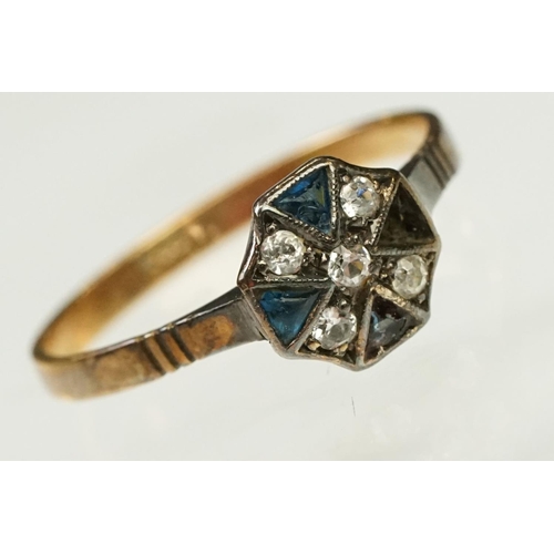 117 - Two Art Deco era gold rings to include an 18ct gold boat head ring set with three diamonds (marked 1... 