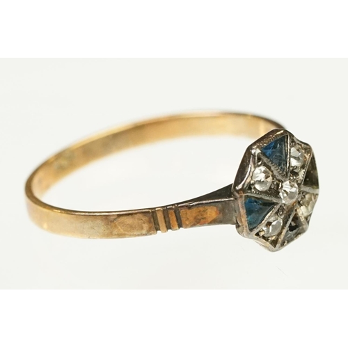 117 - Two Art Deco era gold rings to include an 18ct gold boat head ring set with three diamonds (marked 1... 