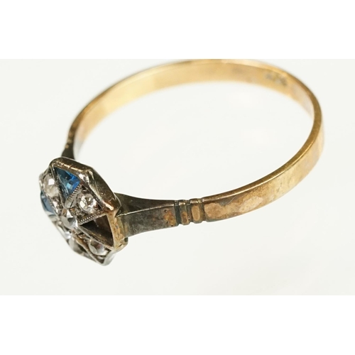 117 - Two Art Deco era gold rings to include an 18ct gold boat head ring set with three diamonds (marked 1... 