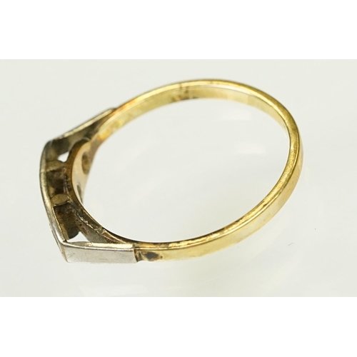 117 - Two Art Deco era gold rings to include an 18ct gold boat head ring set with three diamonds (marked 1... 