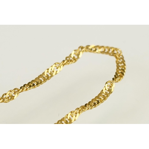 120 - Two 9ct gold bracelet chains to include a faceted curb link chain (hallmarked to jump link), and a f... 