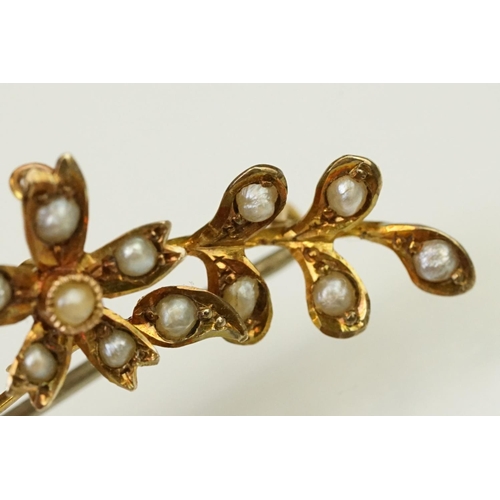 121 - Early 20th Century antique 9ct gold and seed pearl brooch in the form of a floral spray with hinge p... 