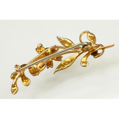 121 - Early 20th Century antique 9ct gold and seed pearl brooch in the form of a floral spray with hinge p... 