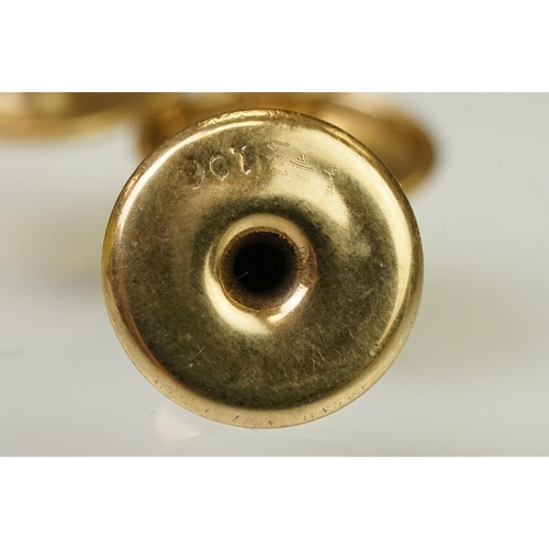 125 - Collection of gold collar studs to include three marked 9ct, and two marked 18ct. 18ct studs measure... 