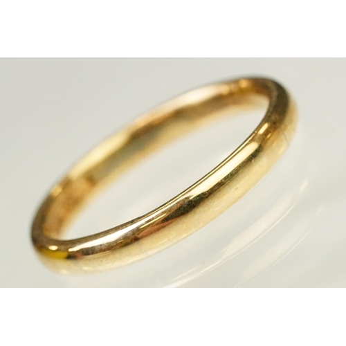 128 - Three 9ct gold hallmarked wedding band rings. The lot to include a wide band ring engraved Claire Lo... 