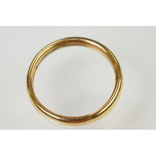 128 - Three 9ct gold hallmarked wedding band rings. The lot to include a wide band ring engraved Claire Lo... 