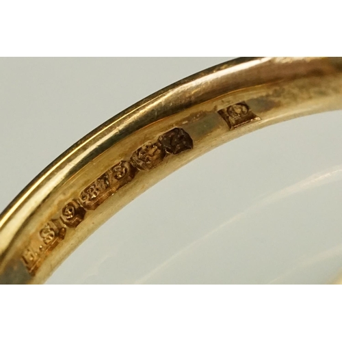 128 - Three 9ct gold hallmarked wedding band rings. The lot to include a wide band ring engraved Claire Lo... 