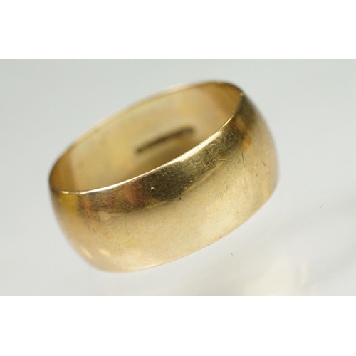 128 - Three 9ct gold hallmarked wedding band rings. The lot to include a wide band ring engraved Claire Lo... 