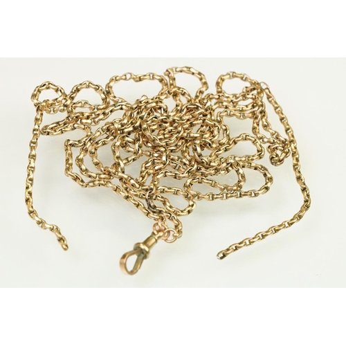 133 - Victorian 9ct yellow gold long guard chain having faceted oval links with swivel clasp. Marked 9ct t... 