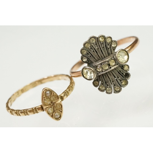 134 - Two antique gold rings to include a Victorian 9ct gold and seed pearl with ring navette head (hallma... 