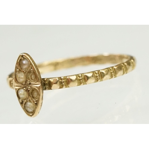 134 - Two antique gold rings to include a Victorian 9ct gold and seed pearl with ring navette head (hallma... 