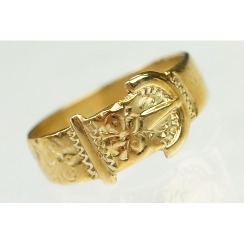 138 - Two 9ct gold rings to include a buckle ring (hallmarked Birmingham 1994, size H.5) together with a u... 