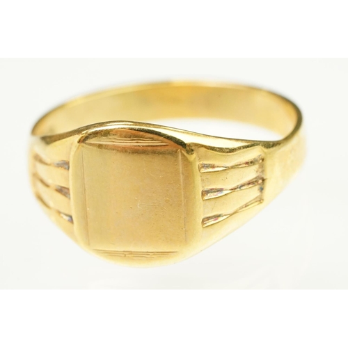 138 - Two 9ct gold rings to include a buckle ring (hallmarked Birmingham 1994, size H.5) together with a u... 