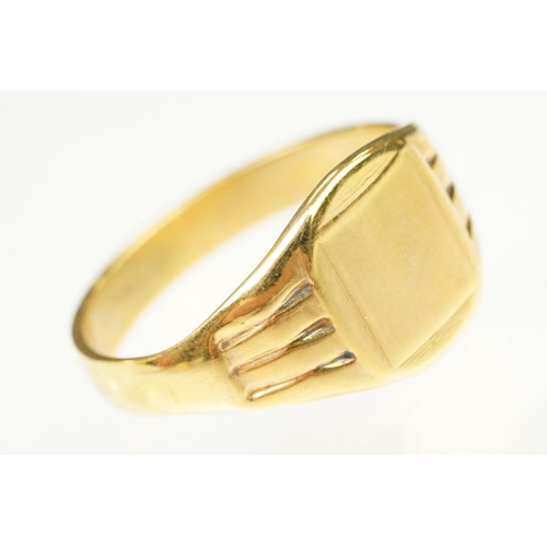 138 - Two 9ct gold rings to include a buckle ring (hallmarked Birmingham 1994, size H.5) together with a u... 