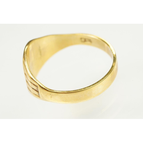 138 - Two 9ct gold rings to include a buckle ring (hallmarked Birmingham 1994, size H.5) together with a u... 