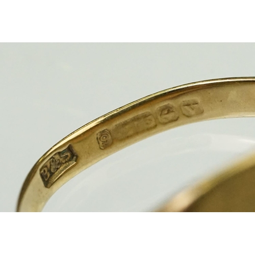 140 - Two 9ct gold signet rings, one having reeded shoulders (marked 9ct, size R), and a plain ring (hallm... 