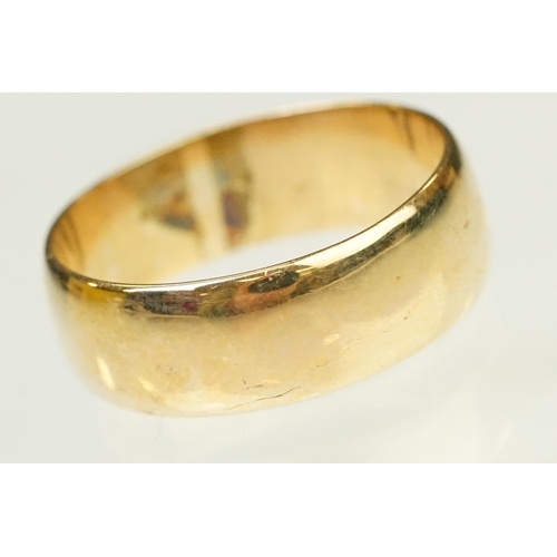 142 - 14ct gold wide band ring of D form. Marked 14k inside band. Size T.