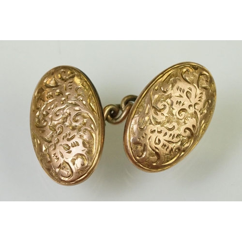 145 - Pair of 1920s 9ct gold hallmarked cufflinks having oval heads with engraved initial panels (hallmark... 