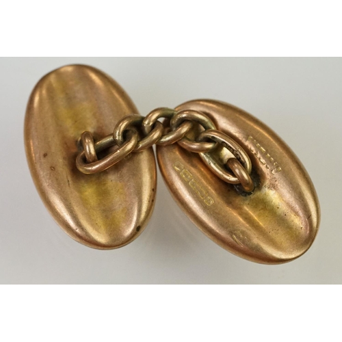 145 - Pair of 1920s 9ct gold hallmarked cufflinks having oval heads with engraved initial panels (hallmark... 