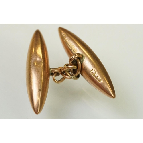 145 - Pair of 1920s 9ct gold hallmarked cufflinks having oval heads with engraved initial panels (hallmark... 