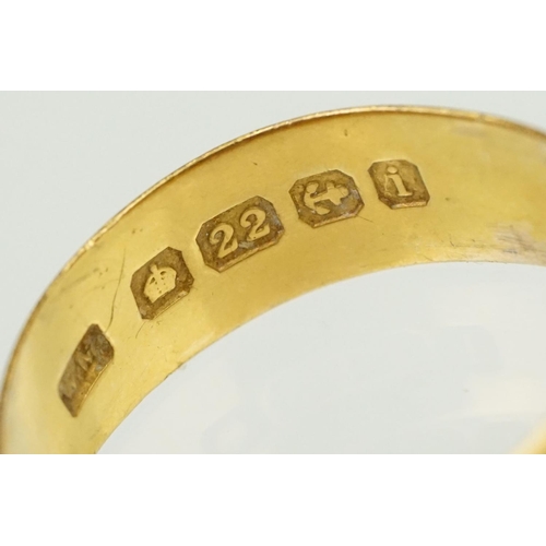 148 - Two hallmarked 22ct gold band rings to include a wide band (hallmarked Birmingham 1908, size N, off ... 