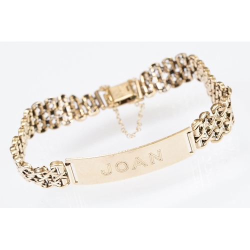 156 - 9ct gold hallmarked identity bracelet having a panel centre engraved 'Joan' on a flat cross link bra... 