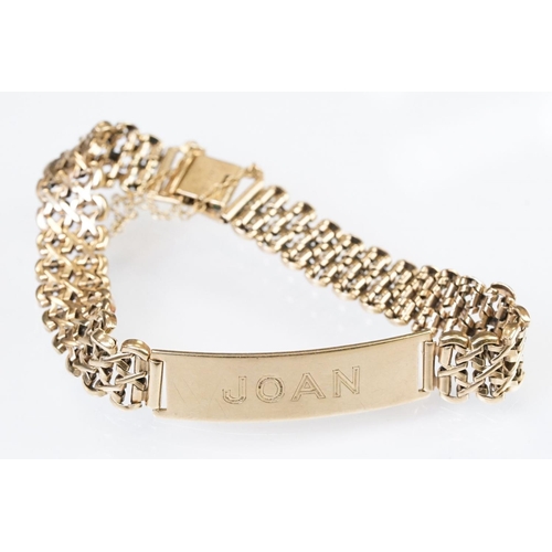 156 - 9ct gold hallmarked identity bracelet having a panel centre engraved 'Joan' on a flat cross link bra... 