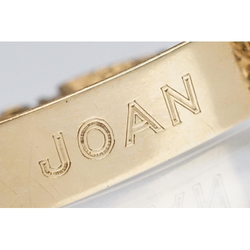 156 - 9ct gold hallmarked identity bracelet having a panel centre engraved 'Joan' on a flat cross link bra... 