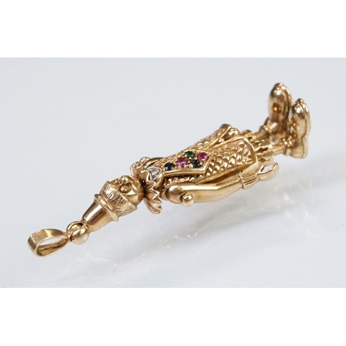 157 - 9ct gold hallmarked clown pendant having articulated limbs set with coloured stones to the tie. Impo... 