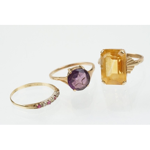 170 - Three 9ct gold stone set rings to include a 9ct gold and citrine dress ring (marked 9ct, size M.5), ... 