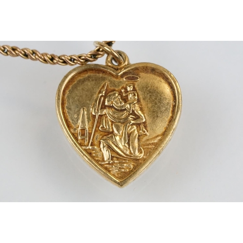 174 - Hallmarked 9ct gold St Christopher pendant necklace. The heart shape pendant suspended from a rope t... 