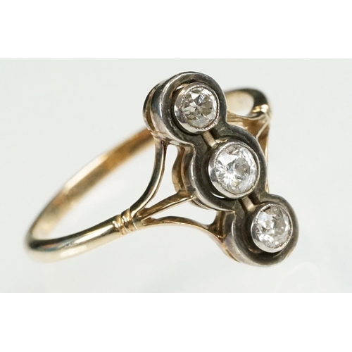 2 - Early 20th Century 18ct gold and diamond three stone ring. The ring being set with three round brill... 