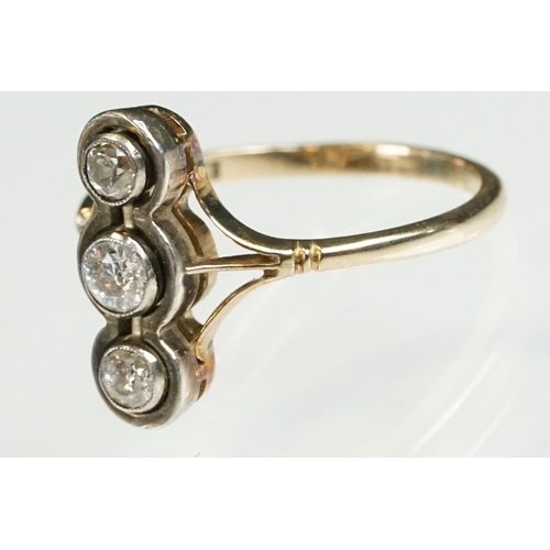 2 - Early 20th Century 18ct gold and diamond three stone ring. The ring being set with three round brill... 