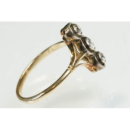 2 - Early 20th Century 18ct gold and diamond three stone ring. The ring being set with three round brill... 