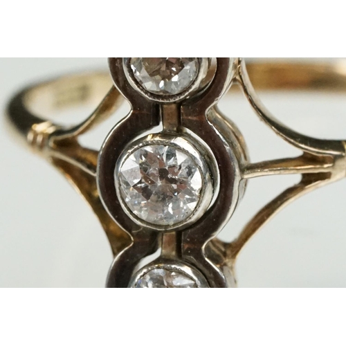 2 - Early 20th Century 18ct gold and diamond three stone ring. The ring being set with three round brill... 