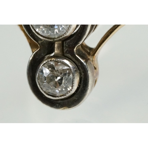 2 - Early 20th Century 18ct gold and diamond three stone ring. The ring being set with three round brill... 