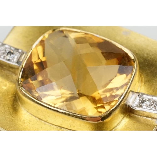 257 - 18ct citrine and diamond pendant necklace being set with a rectangular harlequin cut citrine in a be... 