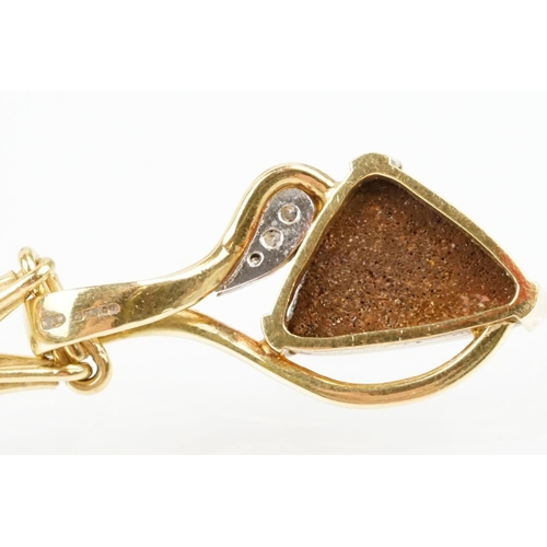 259 - 18ct gold, opal and diamond pendant necklace. The necklace having a triangular boulder opal set with... 