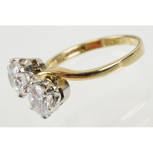 268 - 9ct gold and white stone toi et moi ring set with two round brilliant cut white stones. Hallmarked S... 