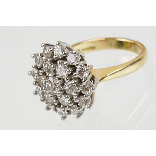 270 - 18ct gold and diamond nineteen stone diamond cluster ring. The ring being set with a central diamond... 