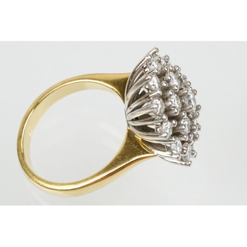 270 - 18ct gold and diamond nineteen stone diamond cluster ring. The ring being set with a central diamond... 