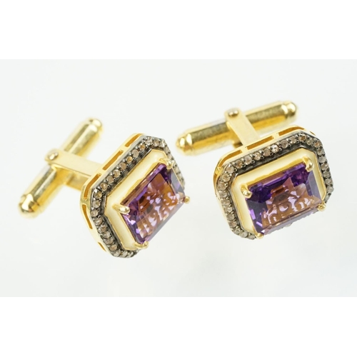 273 - Pair of silver amethyst and diamond set cufflinks being set with emerald cut amethysts to centre sur... 