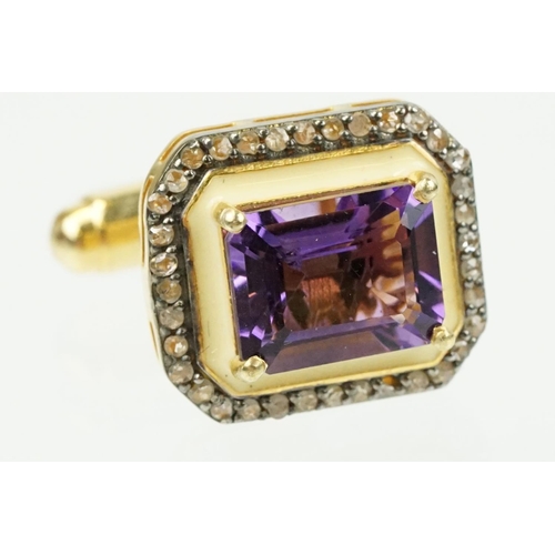 273 - Pair of silver amethyst and diamond set cufflinks being set with emerald cut amethysts to centre sur... 