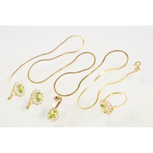 274 - 18ct gold peridot and white stone jewellery suite to include ring, earrings and pendant necklace, ea... 