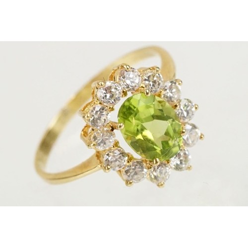 274 - 18ct gold peridot and white stone jewellery suite to include ring, earrings and pendant necklace, ea... 